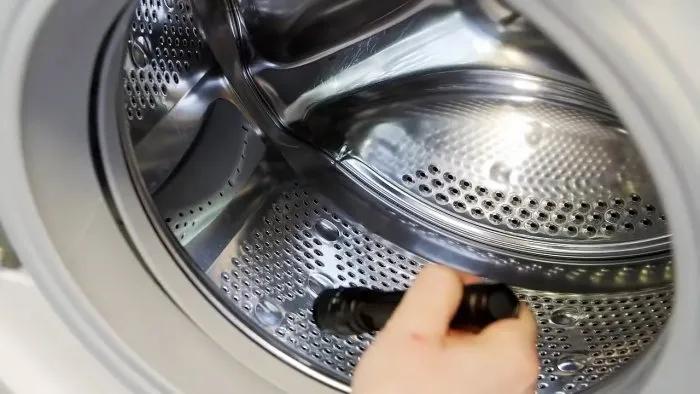 Как извлечь мелкие предметы из стиральной машины