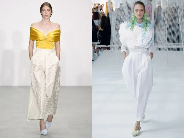 Белые женские брюки: широкие поверх атласного желтого топа под блузку